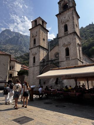 Your shortcut to magical Kotor! This trip is all about the medieval vibes of Kotor’s Old Town—think peaceful sunrises, cobbled streets, and views that seriously flex on your Instagram stories 🏰✨

Must-See in Kotor:  
Old Town of Kotor (CQFC+VF9, Kotor, Montenegro)  
Open all day, all year—so you can plan your adventure without the FOMO.

Early riser hack: Set your alarm! The Old Town is dreamy at sunrise. Streets are empty, shops closed, and local cats run the show—pure, uncrowded fairy tale. The city walls are open, so start your climb early for panoramic views over the Bay of Kotor—no sweaty crowds blocking your shots or your path! 📸

Afterwards, reward yourself: grab a coffee at a tucked-away café in one of those quiet squares. The whole place still feels yours, and you get to savor that medieval buzz in peace.

How to get around:  
Stick to your feet! Old Town is a car-free maze—everything’s walkable, so comfy shoes are a game changer.  
For nearby areas, try the local buses from the Kotor bus station or taxis if you're in a hurry.

Food recs:  
Hit up a local bakery for fresh burek or cheese pastries. For lunch, look for family-owned konobas (taverns) dishing up grilled seafood and risottos.

Quick tips:  
Euros are used everywhere, card accepted in most spots. Summer is hot; bring a hat, water bottle, and sunscreen. No visa needed for most travelers under 90 days—check your country’s requirements!

#KotorOldTown #MedievalMagic #MontenegroMoments #TravelTips #WanderWithMe