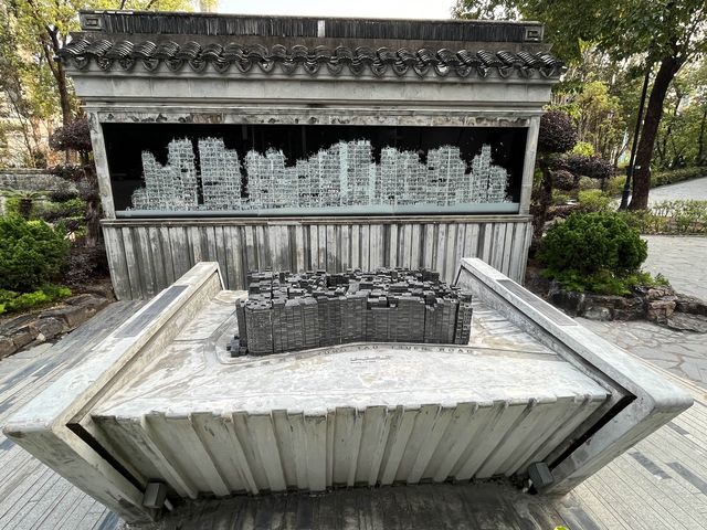 保存了多處歷史古蹟嘅九龍寨城公園