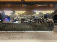 A sip of coffee at Simple Kaffa