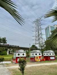 Urban Calm Beneath the Tracks: A Stroll Through Taman Jaya Park