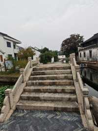 朱家門巷陌，一橋煙雨話狀元