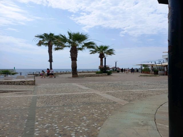 Statue, Sea, and Serenity – A Hidden Gem by the Rocks