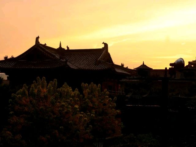 there is a temple hanging from the mountain...