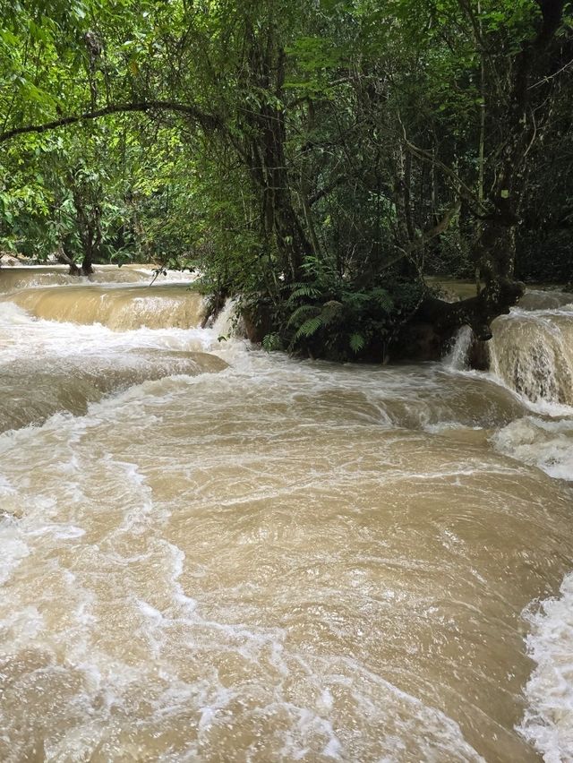 Kuang Si Waterfalls in the Rainy Season: Wild, Wet, Worth It