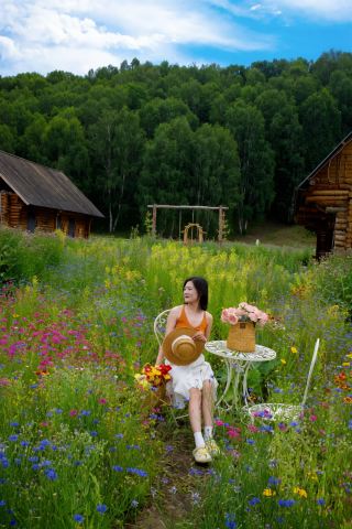 Escape the commercial bustle and stay in a small wooden cabin surrounded by flowers in Hemu