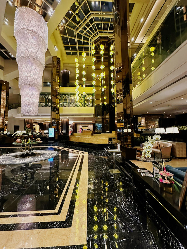 Raya Elegance Beneath the Chandelier at Grand Millennium KL