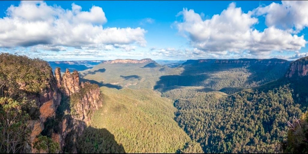Blue Mountains, Australia — A Dreamscape of Misty Valleys and Majestic Cliffs 💙🏞️

Just a scenic journey from Sydney, the Blue Mountains is a spectacular natural destination where endless eucalyptus forests, dramatic sandstone cliffs, cascading waterfalls, and mist-covered valleys create an unforgettable landscape.

The region’s most famous landmark is the Three Sisters, an extraordinary formation of three sandstone peaks overlooking the vast Jamison Valley. From Echo Point Lookout, visitors can enjoy sweeping panoramic views and capture breathtaking photographs of the surrounding wilderness.

Nature lovers can discover the beauty of Wentworth Falls, explore peaceful forest trails, and admire the dramatic cliffs at Govetts Leap Lookout. For a different perspective, Scenic World offers experiences such as the Scenic Railway and cableway, providing memorable views of the forest and valley.

The Blue Mountains is beautiful throughout the year. Autumn brings colourful foliage, winter can create a mysterious misty atmosphere, and warmer months are ideal for exploring the walking tracks. Temperatures can be cooler than in Sydney, so bringing a light jacket and comfortable walking shoes is a good idea.

Nearby attractions to explore: Three Sisters at Echo Point, Wentworth Falls, and Scenic World in Katoomba.

📍 Location: Blue Mountains National Park, New South Wales, Australia

#BlueMountains  #AustraliaTravel  #ThreeSisters  #EchoPoint  #WentworthFalls  #ScenicWorld  #NaturePhotography  #MountainViews  #TravelMoments #travel2026 #travel #naturalwonders 