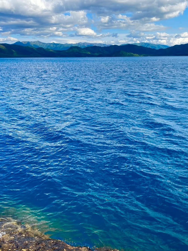The cobalt blue lake surface is beautiful