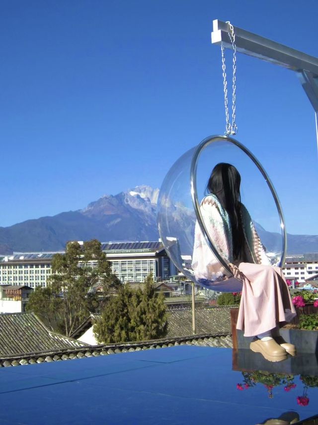 麗江山念…推開窗就是雪山….