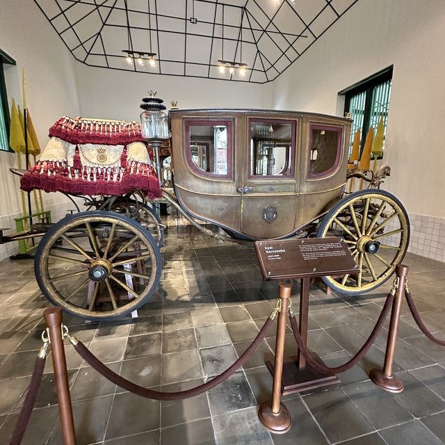 A museum filled with coaches on exhibits