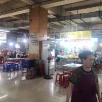 Local meal at Buon Ma Thuot market 