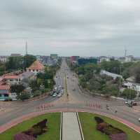 Ascending to Elegance: Patuxay's Embrace Above Vientiane