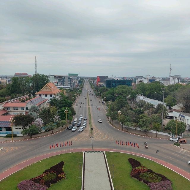 Ascending to Elegance: Patuxay's Embrace Above Vientiane
