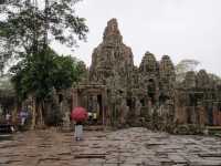 Whispers of Stone: A Morning at Bayon Temple