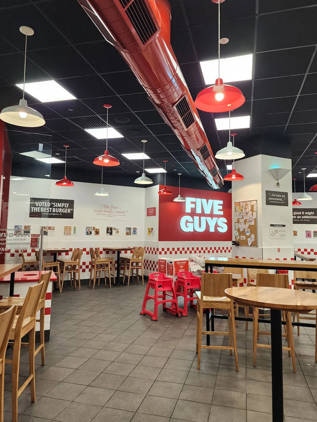 The only thing better than the view? These juicy burgers. 🍔💯 #FiveGuysGenting