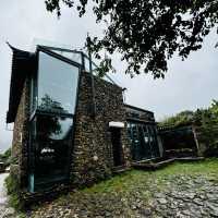 Quaint stone village under Yulong Mountains