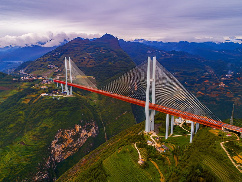 Visit the Beipanjiang Bridge and experience a marvel of infrastructure in the clouds