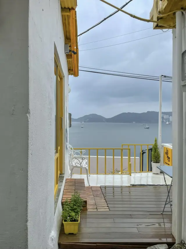 A cafe with a beautiful ocean view.