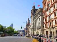 Taking a nice day time stroll across The Bund at Shanghai