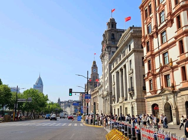 Taking a nice day time stroll across The Bund at Shanghai