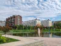 Small Park by Nightlight Town Hotel: A City Oasis by the Internet-Famous Bridge