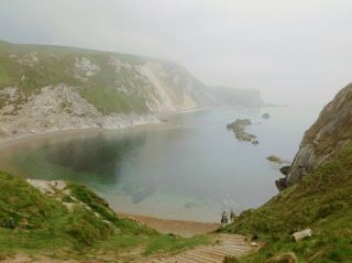 Ready for some wild UK nature vibes? 🌦️ West Lulworth totally delivers with dramatic scenery and epic coastal walks—Durdle Door Holiday Park is the must-stay spot for adventurers and chill seekers alike.

🏞️ Top Spot to Visit:
- Durdle Door Holiday Park (Main Rd, West Lulworth, Wareham BH20 5PU): This park is THE base for exploring Dorset’s Jurassic Coast. Wake up to lush meadows, rolling hills, and views of the iconic rock arch over the sea. Even on cloudy or rainy days, the moody skies make the cliffs and waters look mesmerizing!
- Take the steep walk down to Durdle Door itself—don’t forget your camera for wild sea views and that Insta-worthy limestone arch! Always check for weather changes; misty or rainy air really adds a mysterious edge to your shots.

🌧️ Trip Tips:
- Bring waterproof boots—it gets muddy but the trails are SO worth it.
- Pack extra layers. The wind off the sea is chilly even in summer.
- Early mornings on the trails mean fewer crowds and more peaceful nature. Plus, sunrise colors over the coast are unreal.

🚗 How To Get Around:
- Best hack: drive in and park at Durdle Door Holiday Park for easy access to all walking trails and the seaside. From here, most spots are walkable!

🍽️ Where to Eat:
- Hit up the local café at the holiday park for a hot breakfast and riverside views. Or, head into nearby West Lulworth village for fresh seafood pubs.

☑️ Destination Tips:
- No visa needed for UK visitors from most countries.
- Most places accept card, but bring some cash for small shops.
- Stay weather-flexible! Nature and moody skies are half the magic out here.

#uktrip 
#UKNature #DurdleDoor #JurassicCoast #TravelHacks #CoastalWalks    