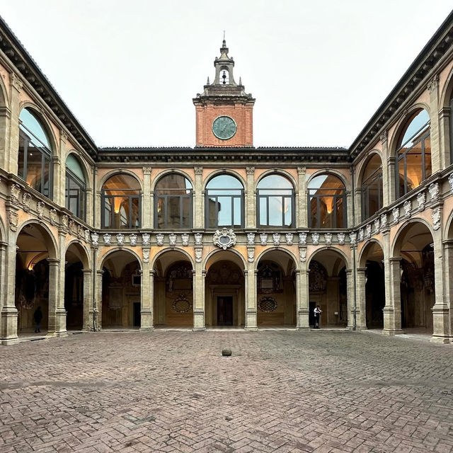 🏛️ *"A Scholar's Retreat: Time-Traveling Through Bologna's Archiginnasio"* ✒️📚