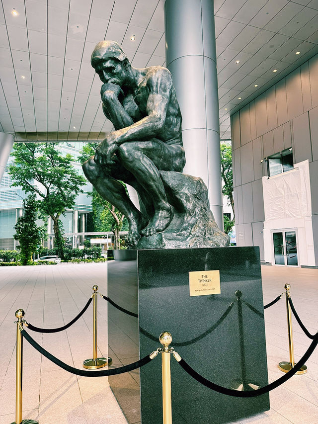 Sculpted Stories at OUE Bayfront: A Lobby of Contemplation and Courage