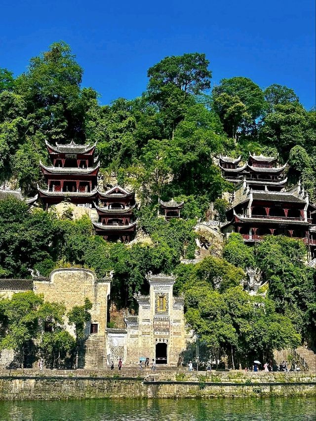 “The Cliff Temple Above the Emerald River”