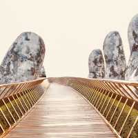 🌉✨ *Golden Bridge (Cầu Vàng): Vietnam’s Giant Hands Holding a Gilded Pathway* 🏞️🌿