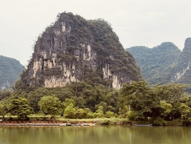 Yulong River (遇龙河)** in Yangshuo, China – a serene paradise of karst landscapes, bamboo rafting, and