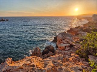 🌅 Where the Sun Meets the Sea: Sunset Magic at Ċirkewwa 🇲🇹✨