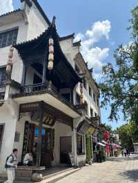 Crescent Reflections: A Journey Through Hongcun’s Timeless Mirror