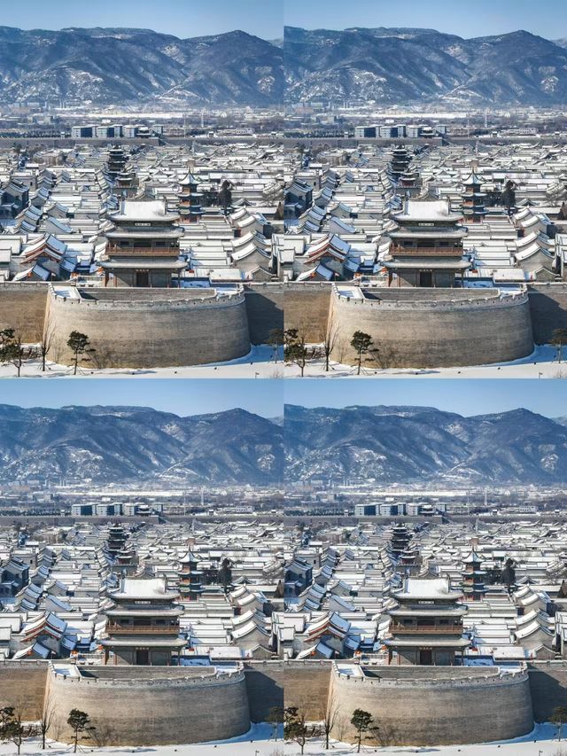 雪落晉陽，太原古城披銀裝！。