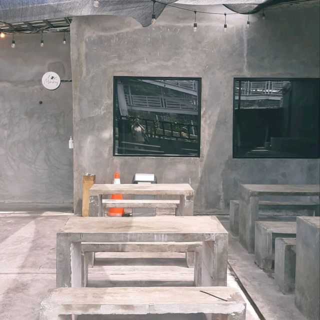 ONE OF THE COFFEE SHOPS NEAR A TRANSJAKARTA BUS STOP