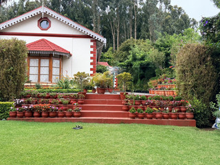 I Found a Place That Felt Like a Fairytale in Ooty
When I travel, I don’t just look for a place to sleep.
I look for places that become part of the story.
That was exactly what happened when I arrived at Kluney Manor in Ooty.
The moment I drove through the entrance, it felt like I had stepped into another era. Surrounded by towering trees, rolling green lawns, and heritage buildings, the entire property carried a timeless charm. It wasn’t the kind of hotel that tries to impress with luxury. Instead, it quietly wins you over with its history, peaceful atmosphere, and old-world character. The heritage estate dates back to the colonial period and still preserves much of its Victorian architecture, making every corner feel like a page from history. (Kluney Manor - Luxury Resort in Ooty⁠￼)
What I loved most wasn’t the room itself.
It was waking up to crisp mountain air, hearing birds instead of traffic, and walking through the gardens while the morning mist slowly lifted over the Nilgiri hills.
There was something incredibly calming about slowing down here.
No rushing.
No endless notifications.
Just the sound of nature and the feeling that time had decided to move a little slower.
As someone who loves meaningful travel, this stay reminded me that sometimes the accommodation becomes just as memorable as the destination itself.

Every pathway, every wooden corridor, and every garden seemed to invite me to pause for a moment longer. If you’re someone who enjoys modern luxury, this may not be the place for you.
But if you appreciate heritage buildings, peaceful surroundings, and places with stories hidden within their walls, Kluney Manor offers an experience that feels different from the usual hotel stay.

Looking back, I don’t just remember staying here.
I remember how it made me feel. Calm.Present.
And for a little while, it truly felt like I had found a place straight out of a fairytale.

If you’re planning a trip to Ooty and want a stay that’s rich in history, surrounded by nature, and filled with old-world charm, Kluney Manor is worth adding to your itinerary.
Sometimes, the places we remember most aren’t the ones with the fanciest rooms.
They’re the ones that make us slow down enough to truly experience where we are.