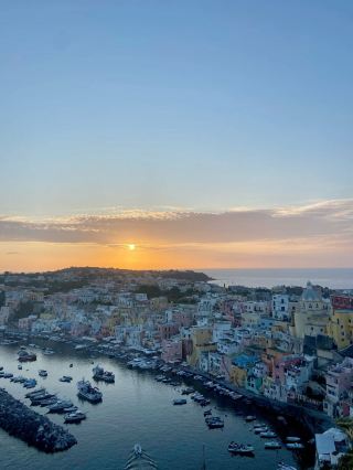 Procida — The Italian Island Where Pastel Houses Tumble Into the Sea and Fishermen Still Mend Their 