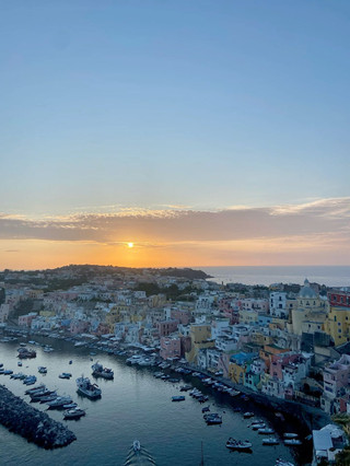 Procida — The Italian Island Where Pastel Houses Tumble Into the Sea and Fishermen Still Mend Their