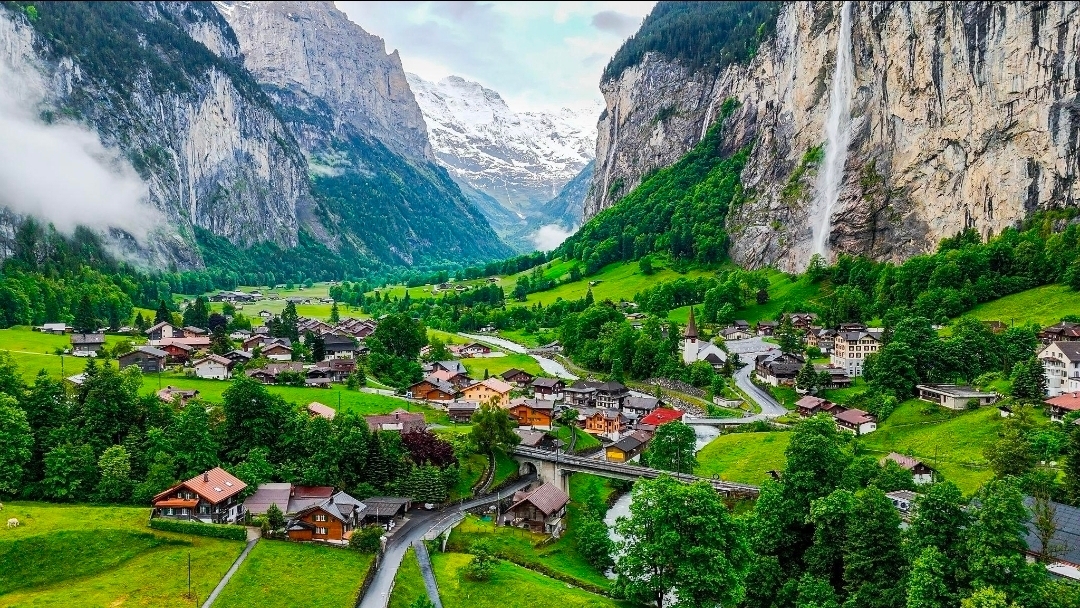 Lauterbrunnen, Switzerland 🇨🇭 — A Fairytale Valley in the Swiss Alps 🏔️💚

Imagine a magical valley surrounded by towering mountains, lush green meadows, charming wooden chalets, and spectacular waterfalls cascading down dramatic cliffs. Welcome to Lauterbrunnen, one of the most breathtaking destinations in Switzerland!

Nestled in the heart of the Swiss Alps, Lauterbrunnen is famous for its stunning natural beauty and peaceful alpine atmosphere. The magnificent Staubbach Falls plunges down a towering rock face, creating one of the valley’s most iconic views. Everywhere you look, you’ll discover postcard-perfect scenery, winding walking trails, traditional Swiss houses, and snow-capped mountain peaks.

🌿 Things to See and Do

· 💦 Admire the spectacular Staubbach Falls.
· 🏡 Wander through the charming village and admire its traditional chalets.
· 🚞 Take a scenic train ride toward Wengen or explore the mountain villages of the Jungfrau region.
· 🌸 Enjoy peaceful walks through green meadows with incredible mountain views.
· 📸 Capture unforgettable photographs of waterfalls, alpine landscapes, and picturesque village streets.

☀️ Best Time to Visit: Late spring and summer are wonderful for green landscapes, flowing waterfalls, and outdoor adventures. Autumn brings beautiful colors, while winter transforms the region into a snowy wonderland.

Lauterbrunnen is more than just a beautiful destination—it feels like stepping into a dream. If you love nature, mountains, and peaceful places, this enchanting Swiss valley deserves a place on your travel bucket list. 💙

Have you ever dreamed of visiting Lauterbrunnen? ✨

#Lauterbrunnen  #Switzerland  #SwissAlps  #VisitSwitzerland  #StaubbachFalls  #NatureLovers  #MountainViews  #TravelMoments  #BeautifulDestinations  #BucketListTravel #naturalwonders #travel #travel2026 