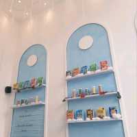 THERE'S AN ICE CREAM AND CEREAL BAR IN PIK WITH ADORABLE CLOUD-THEMED DECOR