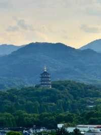 Where Wu Hill's Winds Embrace Centuries, One Tower Captures Hangzhou's Soul