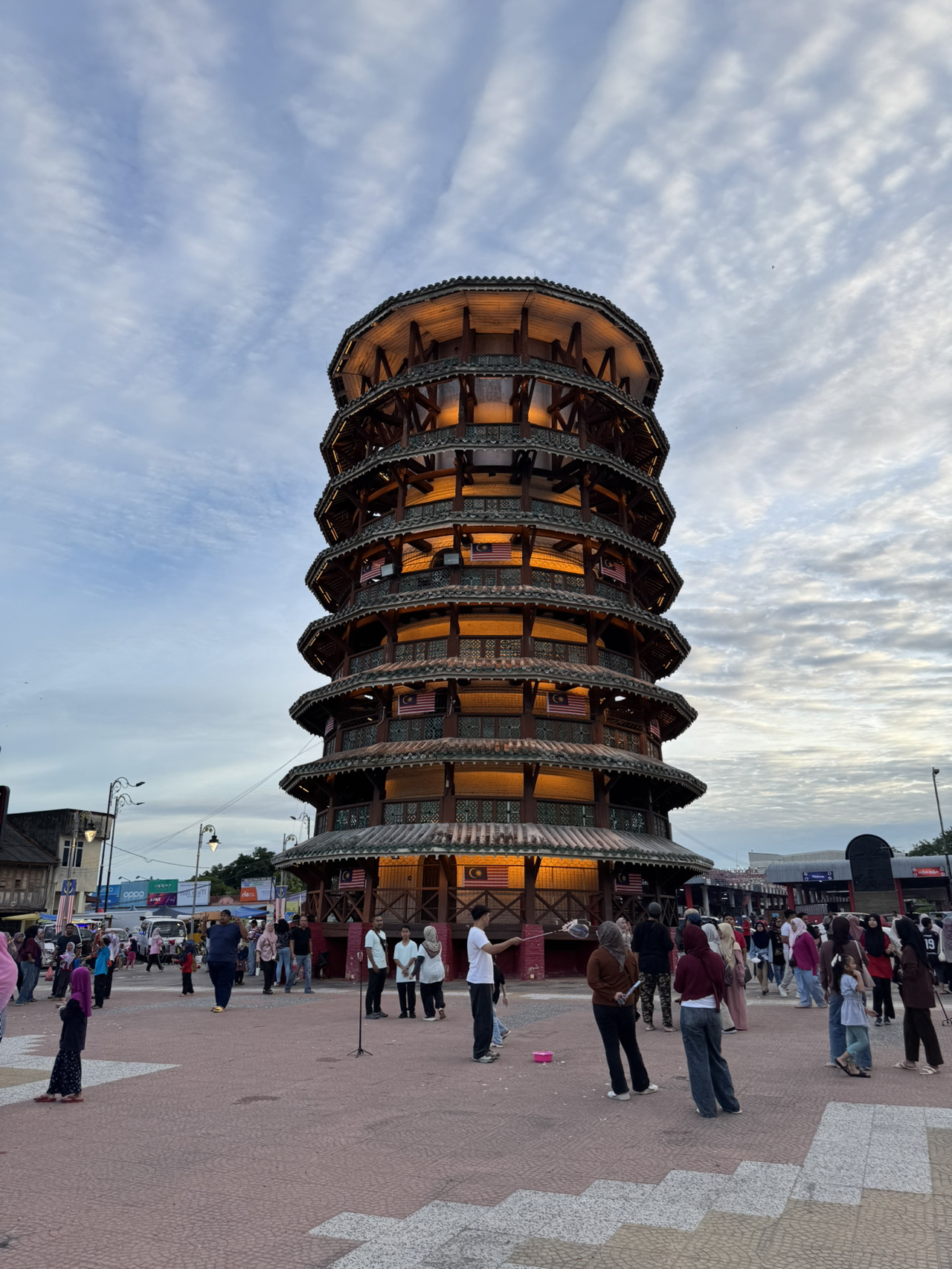 Just explored Durian Sebatang and the iconic Menara Condong Teluk Intan — one of Malaysia’s quirkiest leaning towers and a top photo op spot! 🌴📸

Must-See Place:  
Menara Condong Teluk Intan  
Lot 1&2, Komplex Menara Condong, Jalan Bandar, Pekan Teluk Intan, 36000 Teluk Intan, Perak, Malaysia  
Open daily: 09:00–18:00 (Sat–Sun), 08:00–17:00 (Mon–Fri)

Pro tip: For the absolute best photo, head to Menara Condong just before sunset — the golden-hour light bounces off the tower, making your snaps extra magical! It’s much less crowded in the morning on weekdays, which means no photobombers in your shots. 😉

Getting Around:  
If you’re coming from Durian Sebatang, it’s a quick drive to Teluk Intan town center. Local taxis or Grab are super handy and affordable if you don’t have your own wheels. Even better, the city is walkable around the tower area, so you can explore at your own pace.

What to Eat:  
Don’t leave Teluk Intan without trying the famous Chee Cheong Fun from local hawker stalls nearby. The rice noodle rolls here are legendary — soft, savory, and usually served with pickled chilies. Ask any local for the best stall and they’ll point you in the right direction.

Quick Destination Tips:  
- Bring