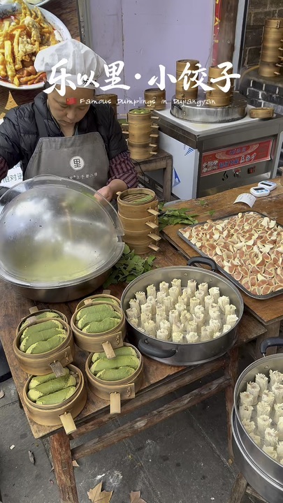 #bucketlistdestinations 🇨🇳 Add this to your Dujiangyan bucket list if you’re doing a day trip from Chengdu 🥟

There are plenty of famous sights in Dujiangyan, but we also wanted to make time for something that felt more local, and this tiny dumpling shop came highly recommended by locals.

乐以里·小饺子 (Leyili) is known for its little dumplings, and one of the best parts is that you can actually watch them being made. The aunties sit at a table right at the entrance, folding the dumplings by hand throughout the day before cooking them fresh.

The dumplings are much smaller than what we’re used to, with around 20 in a bowl. The wrappers are slightly thicker, the tops are left open and they’re filled generously with pork, then tossed in fragrant chilli oil. Savoury, slightly sweet and seriously easy to finish.

We also ordered a few other local favourites:

🥢 烧麦 (Shao Mai)
Juicy, well-seasoned and worth adding if you’re sharing.

🍜 甜水面 (Sweet Water Noodles)
A Chengdu classic with that sweet, savoury and lightly spicy sauce, paired with firm, chewy noodles.

🫘 酥肉豆花 (Crispy Pork with Tofu Pudding)
The one that seems to divide opinions, but we liked it. The silky tofu pudding gave us a lighter contrast to the richer dishes.

There are only a handful of dishes on the menu, and we actually prefer that. You’re not spending 20 minutes trying to decide what to order. Get the little dumplings, add a couple of things to share, help yourself to the free-flow red tea and sit by the storefront.

What makes this one worth putting on the bucket list for us isn’t just the food. It’s being able to sit there and watch the dumplings being folded by hand, eating them almost immediately after they’re made, then continuing on with our day around Dujiangyan.

If you’re already making the trip out from Chengdu, this is an easy local food experience to add alongside the sightseeing.

📍乐以里·小饺子 Leyili
Dujiangyan, China

 #localfood #afternoonteatime #citydaytours #travel2026 #thingstodo #myitinerary #couplestrip #china #chinatravel #bucketlist #sichuan #chengdu #dujiangyan #hotdiscussions 