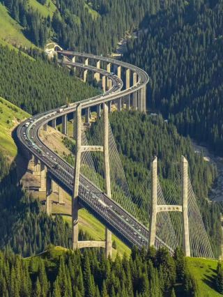 Guozigou Bridge: A Rainbow in the Tianshan Mountains