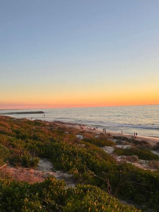 Welcome to Cottesloe! 🏖️ If you’re craving chill vibes, unreal sunsets, and a slice of Aussie beach life, this is the spot you need on your radar. The absolute highlight? The sunsets—trust me, they're mesmerizing and worth every second.

Must-See Place:
Cottesloe Beach
Address: Western Australia, Australia
This stretch of golden sand is legendary for its crystal-clear water, gentle waves, and an endless horizon. Spend your day lounging, swimming, or just people-watching. Around late afternoon, grab an ice cream or a takeaway coffee from one of the local cafes lining Marine Parade, then head straight down to the shore for sunset. The color show as the sun dips into the Indian Ocean is breathtaking (my top tip: don’t miss this moment and bring your camera!).

Getting Around:
Cottesloe is super walkable, and the beach is a quick stroll from Cottesloe train station (Fremantle Line). If you’re coming from Perth city, just hop off the train and you’re minutes from the sand.

Where to Eat:
Check out local faves like Il Lido for Italian bites with a sea view, or pick up fish and chips at Amberjacks for a casual meal by the shore.

Travel Tips:
No entry fees here, just sunscreen! The area can get busy in summer, so head down a little earlier if you want to snag the best sunset spots on the steps or grass terraces.

#Cottesloe  #AussieBeaches  #SunsetViews  #Tripcom 