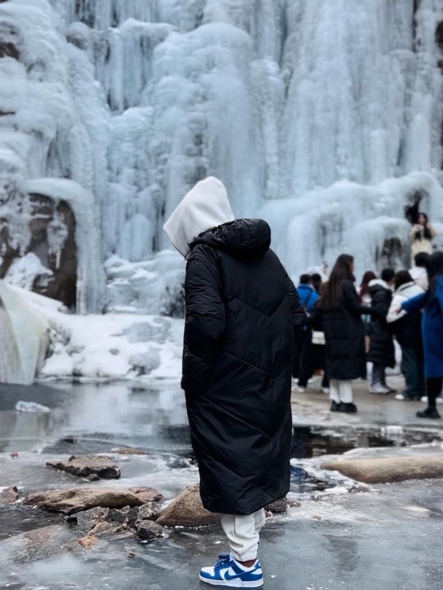 Stand on Frozen Waterfalls of Qingdao