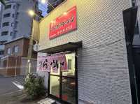 福岡・博多区。とんこつベースの緑色ダーメン『博多ダーメン屋八千代支店』