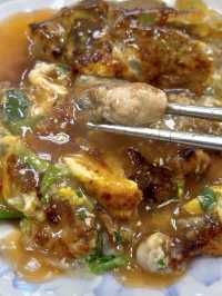 Oyster Egg Omelette on Conveyor Belt: Michelin Dish at Ningxia Night Market