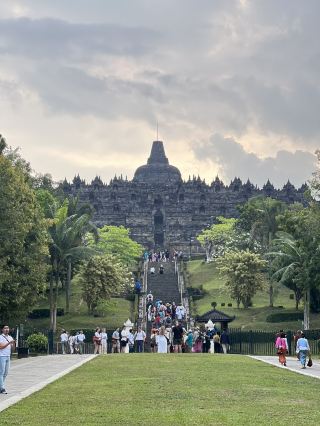 Wondering where epic scenery collides with sacred architecture? 🌄 My recent trip delivered—Borobudur’s legendary temple and the tranquil Udo Shrine in Nichinan were absolute highlights!

Top Spots to Visit
1. Borobudur Temple (Borobudur, Indonesia) 🕍  
Address: 96R3+RH6, Kw. Candi Borobudur, Borobudur, Kec. Borobudur, Kabupaten Magelang, Jawa Tengah 56553  
Open: 06:30–17:30 (last entry 16:30) | Fee: $20  
Tip: Aim for an early visit—the morning light dancing over the stupas is magical, and you dodge crowds/heat. Notice the weather: it swings between sunny, cloudy, and sudden downpours, so pack a poncho or portable umbrella. Bring snacks and water; not much is sold inside, and you’ll want to linger.

2. Udo Shrine (Nichinan, Japan) ⛩️  
Address: 3232 Miyaura, Nichinan, Miyazaki 887-0101  
Open: 07:00–18:00  
Insider nugget: Tucked into dramatic coastal cliffs, the shrine is stunning rain or shine (but clouds and mist amplify the vibe!). Don’t miss the ritual—toss a lucky stone in the turtle-shaped rock below for good fortune.

How to Get Around  
Download a local map to navigate the temple complex and shrine area—signal can be finicky. In Indonesia, Grab taxis are reliable for reaching Borobudur. For Udo Shrine, local buses or taxis from Nichinan work best.

Food Picks  
Near Borobudur: Try a warung (small restaurant) for authentic Indonesian fried rice (nasi goreng).  
At Nichinan: Grab fresh seafood at a local izakaya after your shrine visit.

Travel Smarts  
Admission is cash-only at Borobudur, so bring small bills. At both sites, dress modestly (respectful for temples/shrines). Weather can shift fast—layer up or bring rain protection.

#BorobudurMagic #JapanShrineTrail #TravelTips #CulturalSites #tripdotcom