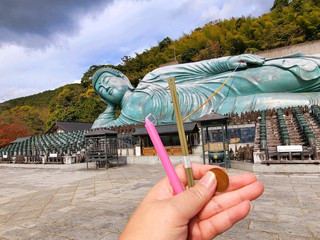 Moo to the max at the Bronze Reclining Buddha in Fukuoka!